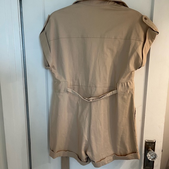 Beige romper with tie front at the waist. Stretchy soft but thick material. - Picture 3 of 3